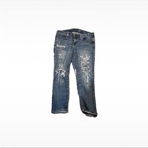 American Eagle ripped blue jeans